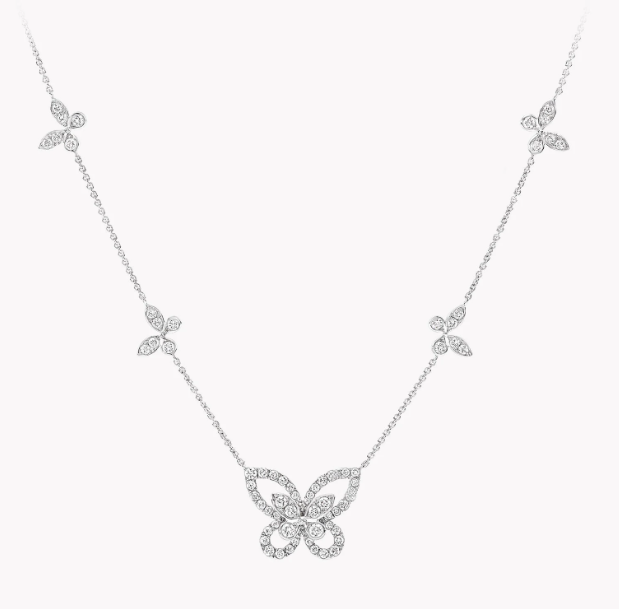 Multi Butterfly Silhouette Diamond Pendant 
Center more complex diamond butterfly, 4 smaller butterflies going up the necklace.